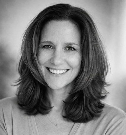 Headshot Corina DuBois smiling woman